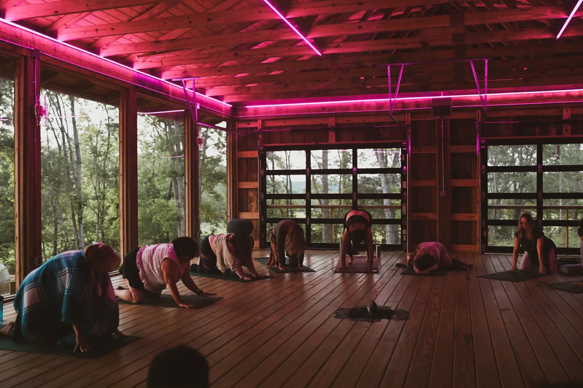 Evening yoga practice in soft pink light